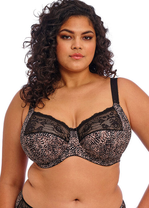 curvy woman wearing a big cup bra in ebony brown with subtile leaves print in soft pink and brown stretch lace
