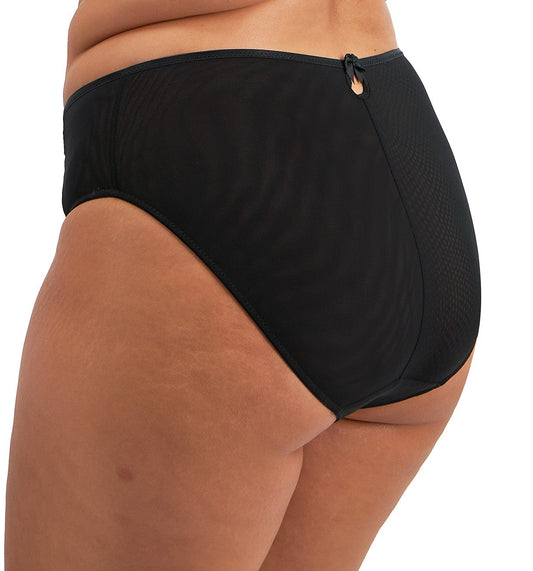 curvy woman wearing a plussize highwaist highleg brief in black mesh with flower details in almond