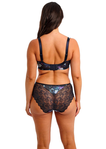 woman wearing a short in midnight blue color with flowerprint and stretch lace