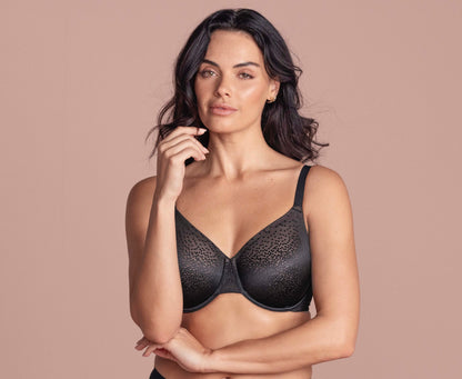 woman wearing a black underwired t-shirt bra with shiny dots