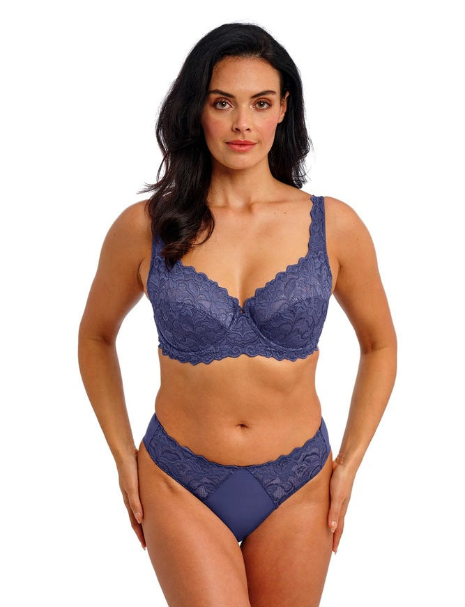 woman wearing a denim blue lace bra with matching brief
