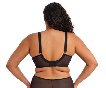 curvy woman wearing a black big cup bra in mesh