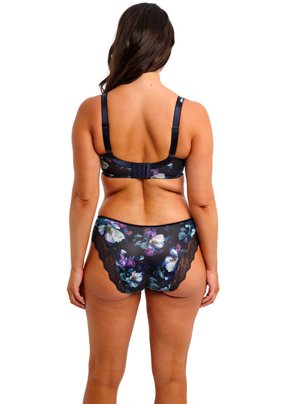 woman wearing a brief in midnight blue color with flowerprint and stretch lace