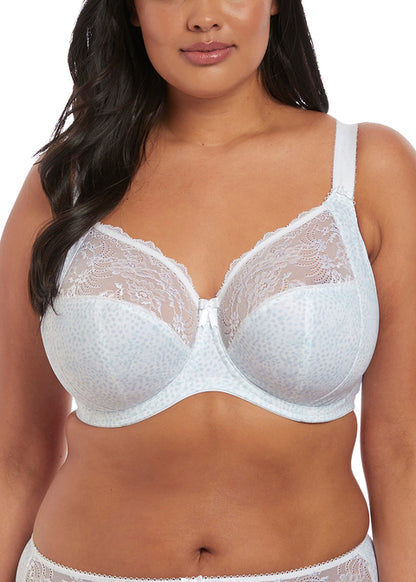 curvy woman wearing a big cup bra in white with subtile leaves print and stretch lace 