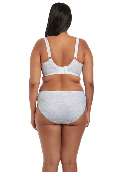 curvy woman wearing a big cup bra in white with subtile leaves print and stretch lace 