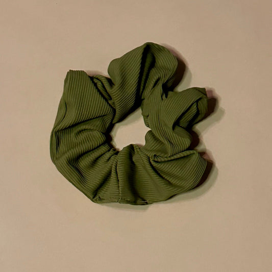 khaki ribbed scrunchie on a beige background