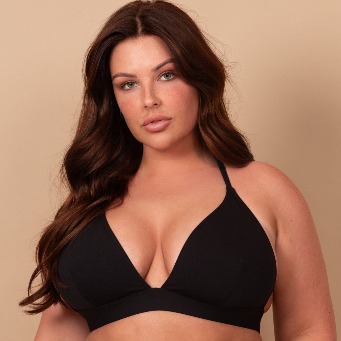 The Class Triangle Bikini Top with wide elastic support and adjustable hook closure