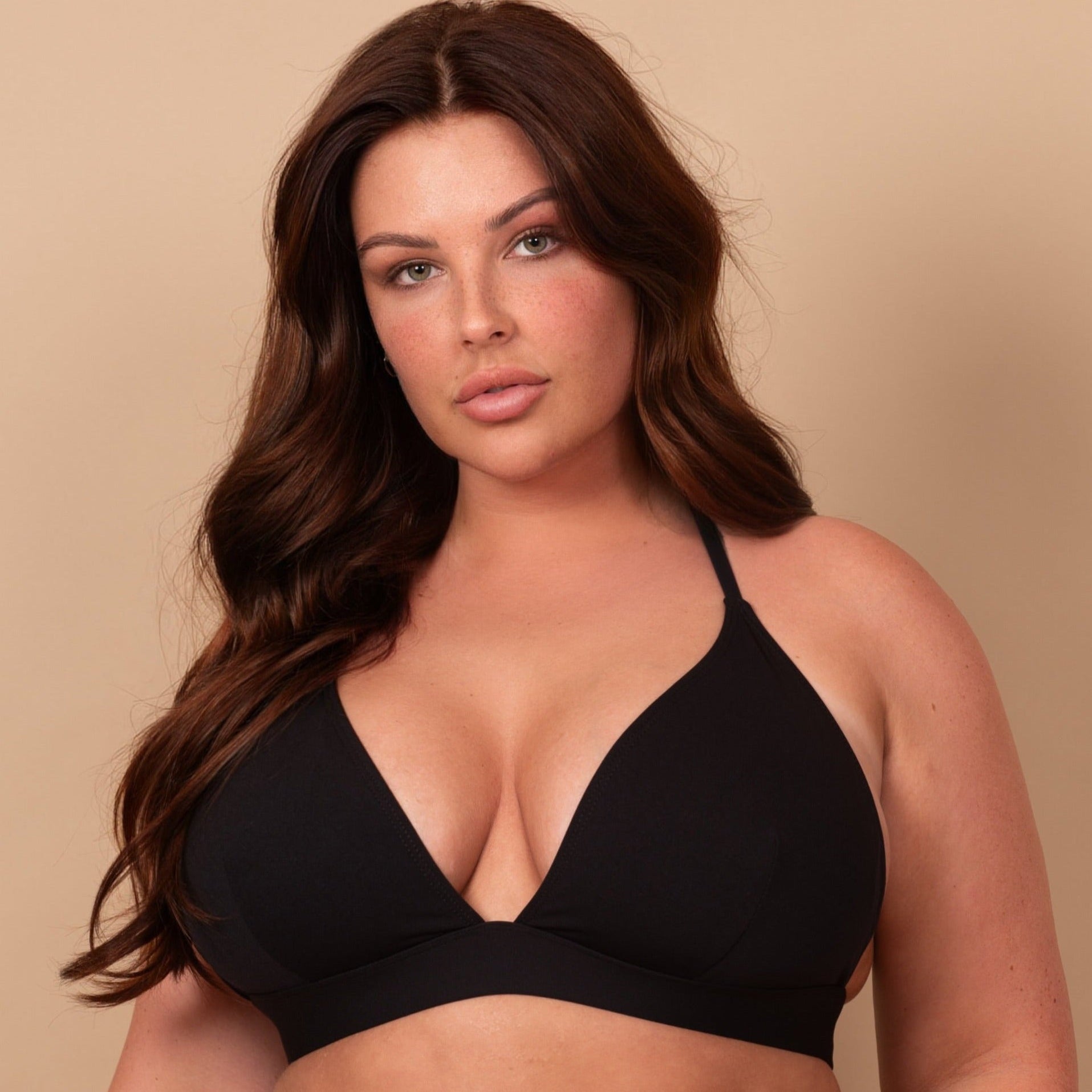 The Class Triangle Bikini Top with wide elastic support and adjustable hook closure