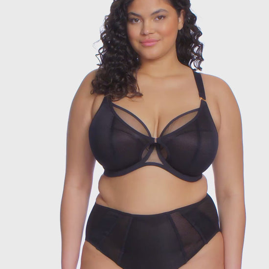curvy woman wearing a black big cup bra in mesh with matching brief