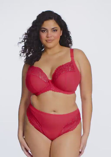 curvy woman wearing Red women's underwear with lace trim on a white background